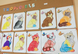 Dzieci z grupy Tropiciele pokolorowały obrazek kota.