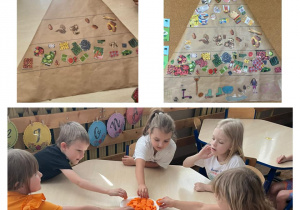 Dzieci z grupy "Smerfy" tworzą piramidę zdrowego żywienia oraz degustują marchewkę