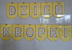 Zdjęcie przedstawia grafikę związaną z Dniem Kropki