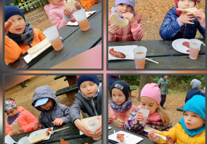 Dzieci z grupy Liski siedzą przy stolikach i jedzą upieczone kiełbaski.